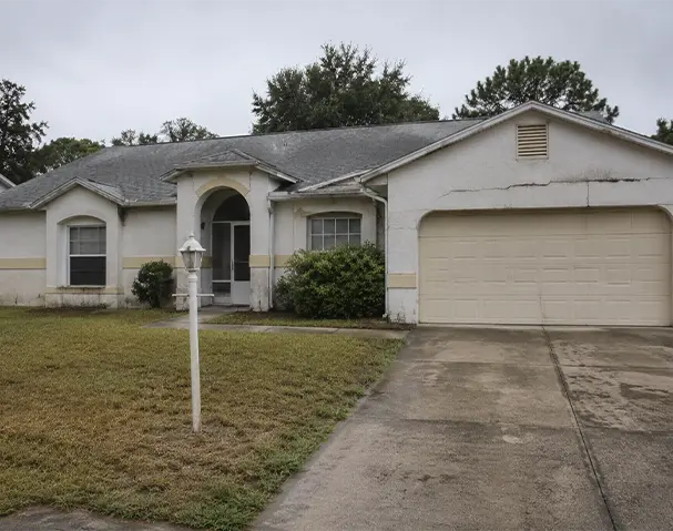 Selling sinkhole affected Spring Hill property Florida Statute 627.706 1970s 1990s tract housing karst geology Hernando County